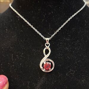 Silver Pendant Necklace with Red Gemstone
